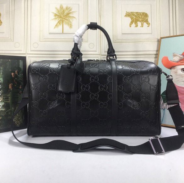 G*u*i travel bags